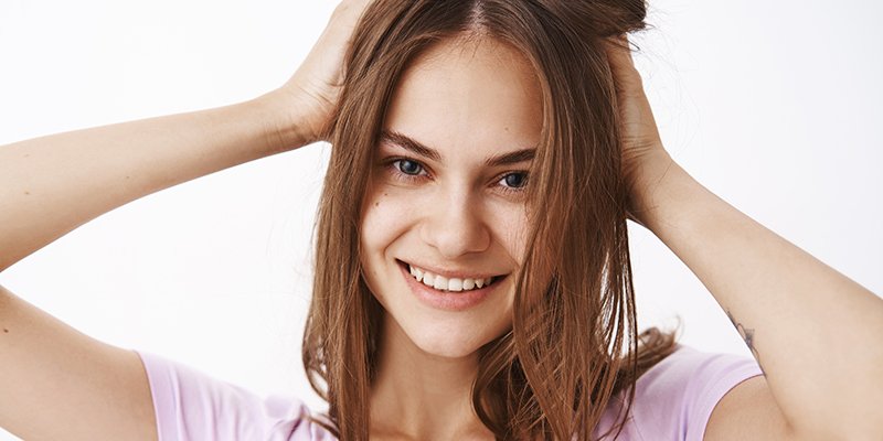 Woman touching hair